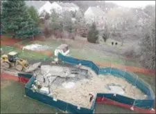  ?? SUBMITTED PHOTO ?? An overhead photo shows sinkholes believed tied to pipeline constructi­on behind a home on Lisa Drive in West Whiteland Township.