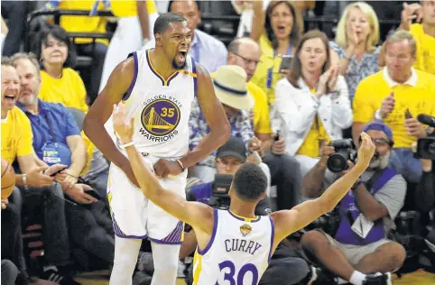  ?? Marcio Jose Sanchez / Associated Press ?? Kevin Durant’s arrival in the Bay Area has made an already Warriors juggernaut even more fearsome, as seen in this year’s playoffs.