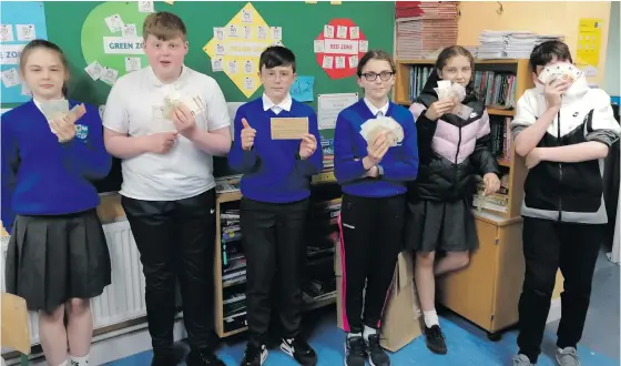  ??  ?? Pupils at St John’s National School, Ballisodar­e, who took part in the Junior Entreprene­ur Programme this year.