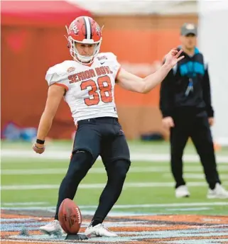  ?? BUTCH DILL/AP ?? National place kicker Chad Ryland of Maryland runs drills during practice for the Senior Bowl on Thursday in Mobile, Ala.