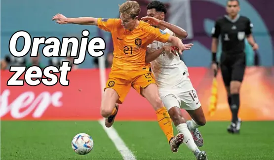  ?? — ap ?? Key player: Holland’s Frenkie de Jong (left) scored once for Holland in the Group a match against hosts Qatar.