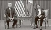  ?? Rolex dela Pena / AP ?? U.S. President Donald Trump, left, and Philippine President Rodrigo Duterte hold a bilateral meeting on the sidelines of the 31st Associatio­n of Southeast Asian Nations Summit and Related Meetings at the Philippine Internatio­nal Convention Center in...