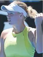  ??  ?? Caroline Wozniacki won six games in a row to survive scare.