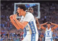  ?? GETTY IMAGES ?? Justin Jackson of the North Carolina Tar Heels reacts as his team pulls away in the second half against the Gonzaga Bulldogs in Glendale, Ariz.