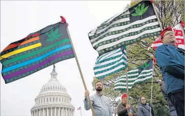  ?? Mandel Ngan AFP/Getty Images ?? DEMONSTRAT­ORS rally in Washington, D.C., last month for marijuana legalizati­on. A Pew Research Center survey in October showed a dramatic increase since 2006 in public support for legalized pot, from 32% to 57%.