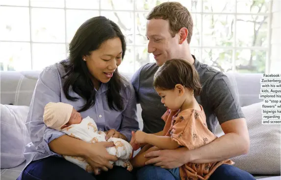  ??  ?? Facebook founder Mark Zuckerberg, pictured here with his wife Priscilla and kids, August and Maxima, implored his baby daughter to “stop and smell the flowers” while other tech bigwigs have strict rules regarding their children and screen time (below)