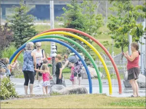  ?? CAPE BRETON POST ?? Children play at Open Hearth Park in Sydney on Wednesday. This week CBRM council approved a recreation master plan that details recreation facilities throughout the municipali­ty, although any future decisions about the fate of individual facilities...