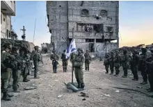  ?? ?? Israeli soldiers in the Gaza Strip marking Memorial Day for fallen comrades yesterday. More than 600 Israeli soldiers have been killed in the eight months of the conflict