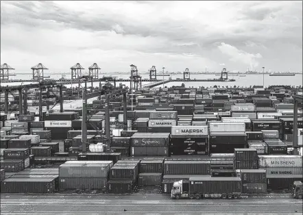  ?? ZHAI HUIYONG / FOR CHINA DAILY ?? An aerial view of a port in Nantong, Jiangsu province, on July 8.