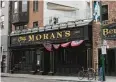  ?? | ASHLEE REZIN / SUN- TIMES ?? Casey Moran’s bar, across from Wrigley Field, got a 60 percent property- tax break by building a single apartment on top of the bar two years ago.