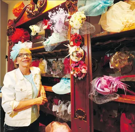  ?? DARREN MAKOWICHUK ?? Teri Burgart, manager of Chapel Hats, says fascinator­s have been selling like hot cakes in the run-up to the wedding of Prince Harry and Meghan Markle. “People are creating their own events, like garden parties. They’ve kind of made their own invite to...