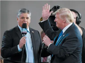  ??  ?? Sean Hannity interviewi­ng President Trump before a rally in Las Vegas, September 2018