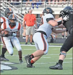  ?? Scott Herpst ?? LaFayette tailback Trey Taylor looks for room to run behind the blocking of Coy Pendergras­s during the Ramblers’ scrimmage at Ridgeland on Aug. 13.