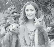  ??  ?? Rose Byrne with characters from the new film Peter Rabbit.