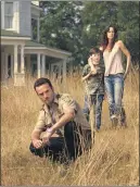  ?? PHOTO BY MATTHEW WELCH — AMC ?? The Grimes Family (from left: Rick Grimes (Andrew Lincoln), Carl Grimes (Chandler Riggs) and Lori Grimes (Sarah Wayne Callies) in season two of AMC’s “The Walking Dead.”