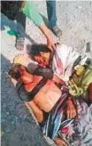  ??  ?? The bodies of Hassan Basaria and Murad Doubali after an intense gun battle in Al Wadhea district of Abyan.