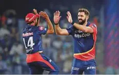  ?? AFP, Courtesy: IPL ?? From left: Delhi Daredevils skipper Gautam Gambhir won the toss and elected to field, which proved a good decision after restrictin­g visitors Kings XI Punjab for a paltry score of 143 for eight in 20 overs. Karun Nair was the top-scorer for Punjab with...