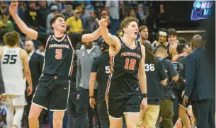  ?? RANDALL BENTON/AP ?? Princeton guard Jack Scott, left, and forward Caden Pierce celebrate Saturday after the Tigers’ second-round NCAA Tournament victory over Missouri.