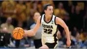  ?? CHARLIE NEIBERGALL — THE ASSOCIATED PRESS ?? Iowa guard Caitlin Clark drives up court in the second half of a second-round college basketball game against West Virginia in the NCAA Tournament, Monday, March 25, 2024, in Iowa City, Iowa.