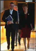  ??  ?? Derek Mackay and First Minister Nicola Sturgeon arrive for the Budget