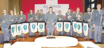  ??  ?? The sound of Switzerlan­d: The Swiss Army Band and its musical director Capt. Stephane Terrin (center).