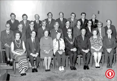  ??  ?? Ashford Urban District Council, 1974. The former council in the months before Ashford became a borough. The outgoing chairman of the council, Cllr Weatherall, can be seen here with many familiar faces from the past. Sadly many of those pictured are no...