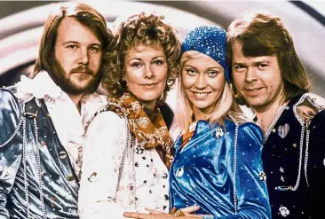  ?? — Reuters ?? Beloved band: Andersson, Lyngstad, Faltskog and Ulvaeus striking a pose after winning the Eurovision Song Contest in 1974.