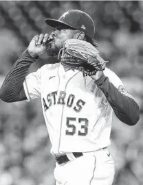  ?? Elizabeth Conley / Staff photograph­er ?? Astros reliever Cristian Javier ends his 12⁄3-inning stint in style by striking out Cesar Hernandez to end the seventh.