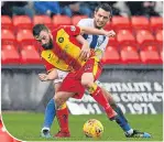  ??  ?? Steven Lawless and Killie’s Gary Dicker