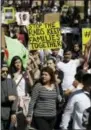  ?? THE ASSOCIATED PRESS ?? A group marches away from the Texas Capitol during an immigratio­n protest Thursday in Austin, Texas.