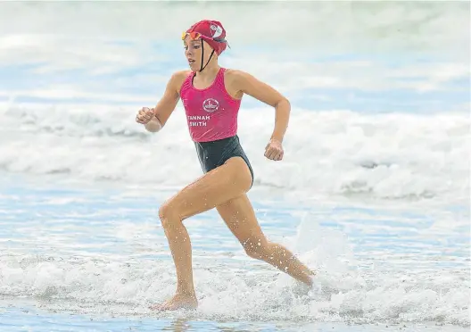  ?? Picture: TOPFOTO.NET ?? LEADING THE WAY: Tannah Smith at the SA Surf Lifesaving championsh­ips being held at Kings Beach