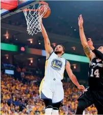  ?? AFP ?? Golden State Warriors ‘s Stephen Curry (No: 30) goes up for a layup against the San Antonio Spurs. —