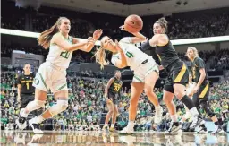  ??  ?? Oregon guard Jaz Shelley (4) is fouled by Arizona State guard Robbi Ryan.