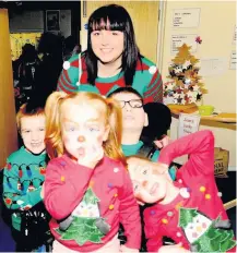  ?? ?? Looking the part Children took advantage of the festivethe­med face-painting supplied by contributo­rs on the day