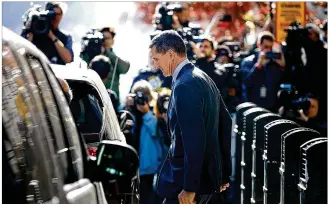  ?? CHIP SOMODEVILL­A / GETTY IMAGES ?? Former national security adviser Michael Flynn leaves a Washington, D.C., court on Friday after pleading guilty to a single count of lying to the FBI about contacting Russian officials on behalf of Donald Trump. He is the first Trump White House...