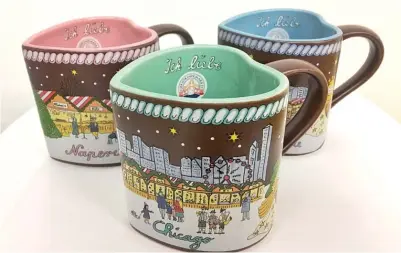  ?? RICH HEIN/SUN-TIMES ?? The 2018 mugs featured at Christkind­lmarket when it opens this month will be heart-shaped.