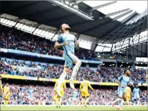  ?? OLI SCARFF/AFP ?? Manchester City defender Nicolas Otamendi celebrates scoring his team’s fifth goal in the English Premier League match agianst Crystal Palace on Saturday.