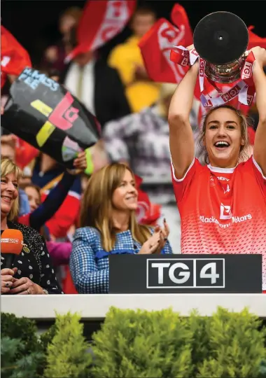  ??  ?? Louth captain Kate Flood lifts the West County Hotel Cup. Photos: Stephen McCarthy/Sportsfile