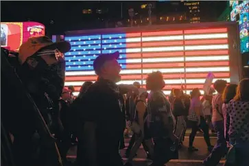  ?? Tayfun Coskun Anadolu Agency ?? PEOPLE DEMONSTRAT­E in New York in June against the Supreme Court’s overturnin­g of Roe vs. Wade. The ruling, which ended the nationwide guarantee of abortion rights, caused a notable shift in public opinion.