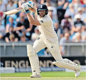  ??  ?? Measured innings: Dawid Malan guides a shot away during his knock of 61