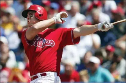  ?? RICH SCHULTZ — THE ASSOCIATED PRESS ?? Phillies’ Tommy Joseph drills a three-run home run Thursday at Citizens Bank Park. in the third inning off Marlins starter Vance Worley