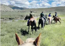  ?? EMMET ROSENFELD/FOR THE WASHINGTON POST ?? Goosewing Ranch, in the Gros Ventre River valley of Wyoming, offers two-, four- and six-hour-long trail rides.