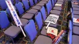  ?? Tom Gralish/ Philadelph­ia Inquirer ?? Union support signs are left behind following the first- ever Workers’ Presidenti­al Summit hosted by the the Philadelph­ia Council of the AFL- CIO at the Philadelph­ia Convention Center in September 2019.