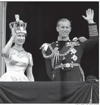  ?? AP/LESLIE PRIEST ?? Britain’s Queen Elizabeth II and Prince Philip, Duke of Edinburgh, wave to supporters from the balcony at Buckingham Palace after her coronation at Westminste­r Abbey in London in this June 2, 1953, file photo. At the age of 96, Britain’s Prince Philip...