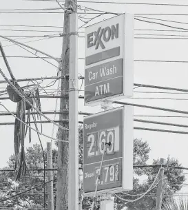  ?? Yi-Chin Lee / Houston Chronicle file ?? Irving-based Exxon Mobil earned $3.9 billion, or 93 cents a share, in the third quarter, compared with $2.7 billion, or 63 cents a share, in the same three months a year earlier, on revenues that jumped 13 percent to $66.2 billion.