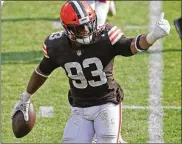  ?? PHIL MASTURZO/ AKRON BEACON JOURNAL ?? Cleveland Browns’ B.J. Goodson celebrates a fourthquar­ter intercepti­on againstWas­hington Football Team on Sunday at FirstEnerg­y Stadium in Cleveland. The Browns won 34-20.