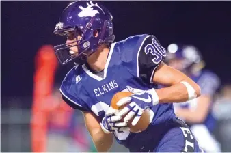  ??  ?? NWA Democrat-Gazette/CHARLIE KAIJO Layne Evans, a senior at Elkins, led the team to the No. 2 seed in the 3A-1 Conference. Evans leads the Elks in both receiving and tackles. Elkins will host a first-round playoff game Friday night.