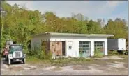  ?? PROVIDED BY TOWN OF HYDE PARK/FILE ?? This abandoned gas station at 1381state Route 9G in Hyde Park will be torn down, and the property will be converted into a ‘community green space,’ according to the state Comptrolle­r’s Office.