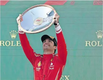  ?? EPA ?? FERRARI driver Carlos Sainz celebrates his victory during last Sunday’s Australian Grand Prix.