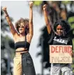  ?? REUTERS ?? Women gesture during a protest outside of City Hall against racial inequality in the aftermath of the death in Minneapoli­s police custody of George Floyd in Los Angeles, June 6.